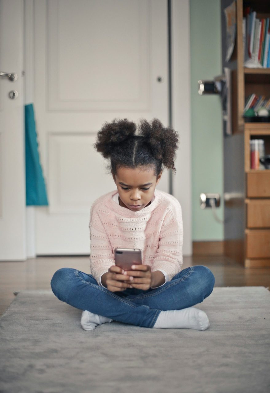 kid on phone by bruce mars